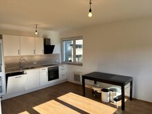 Wohnzimmer mit Küche