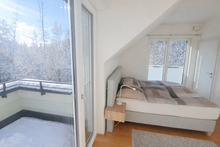Schlafzimmer mit Balkon
